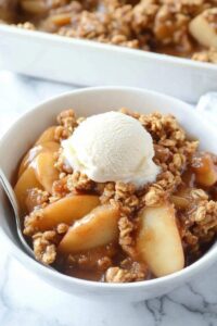 apple crisp with oatmeal topping served with ice-cream