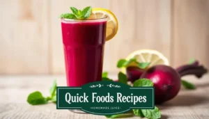 A glass of beetroot juice with mint and lemon slice, featuring the Quick Foods Recipes logo in a clean wood background